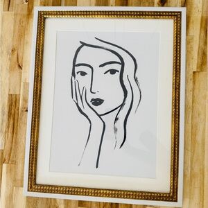 Minimalist Black and White Portrait with Gold Frame